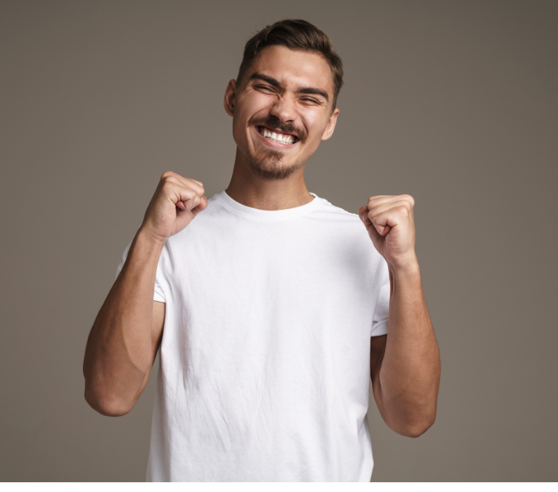 Man raising hands celebrating